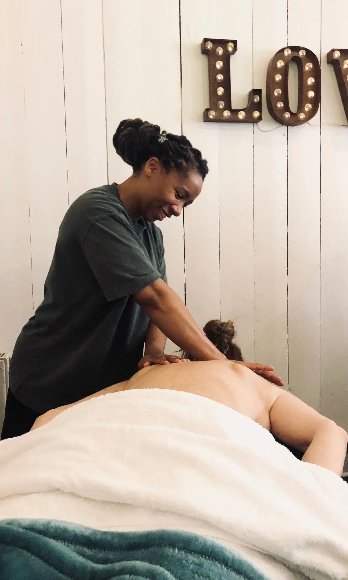 Leana performing massage therapy